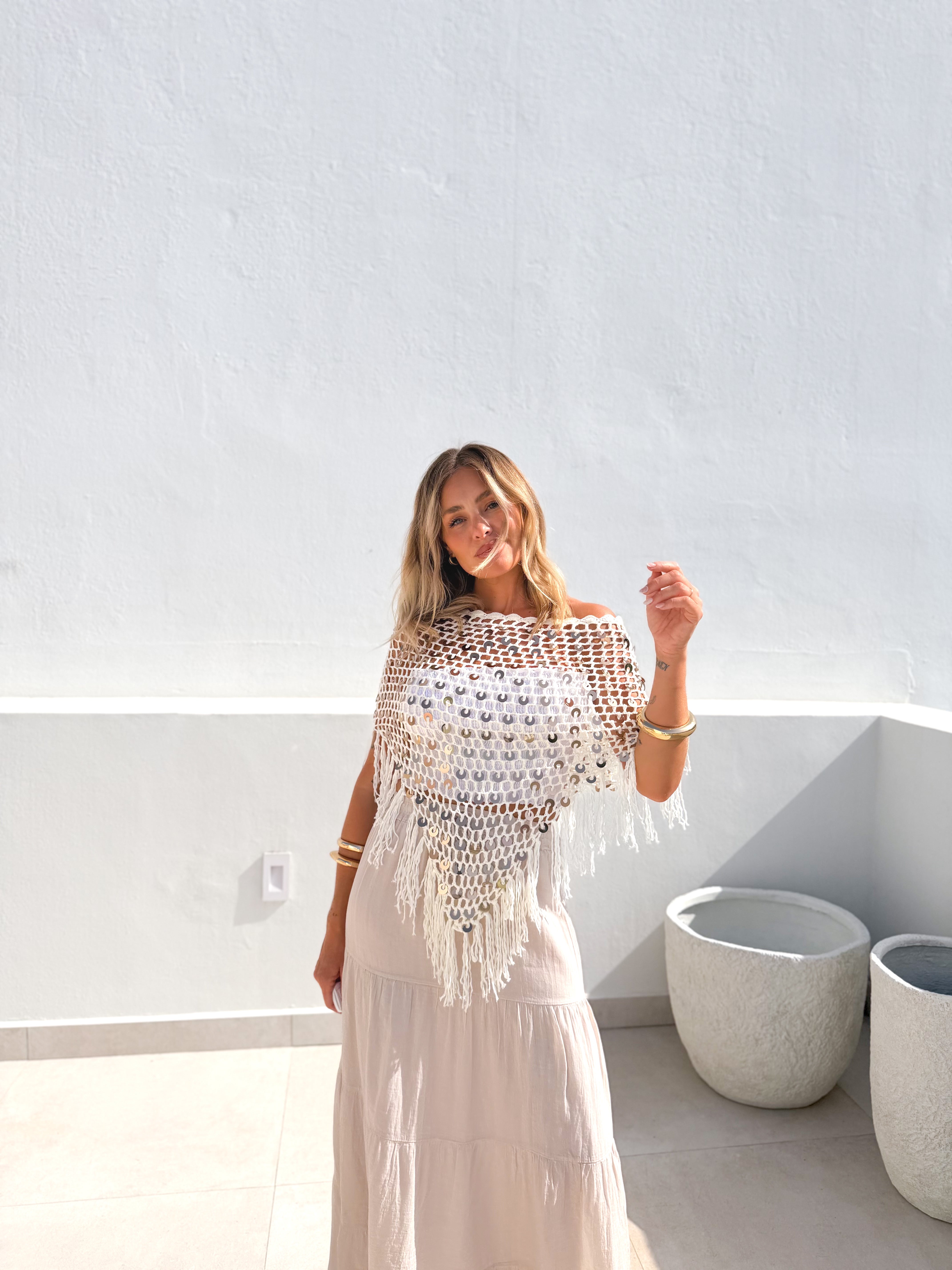 Poncho crochet crudo