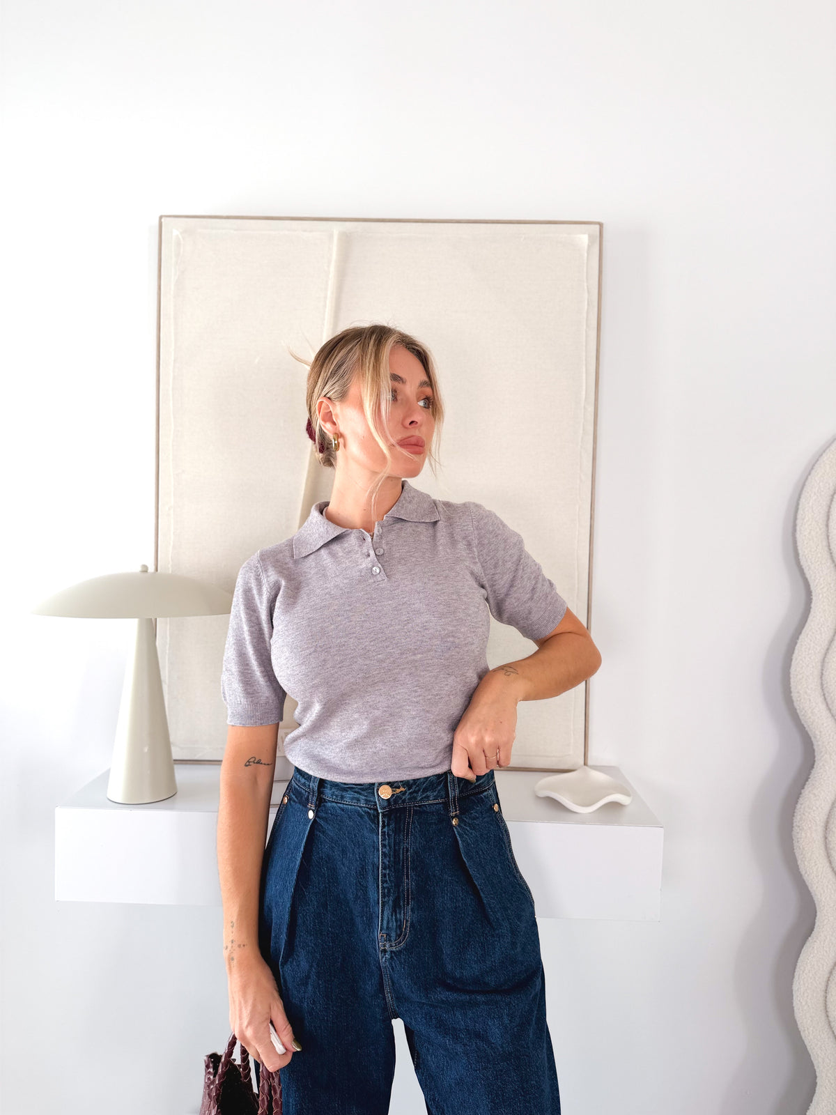 Suéter polo abotonado gris