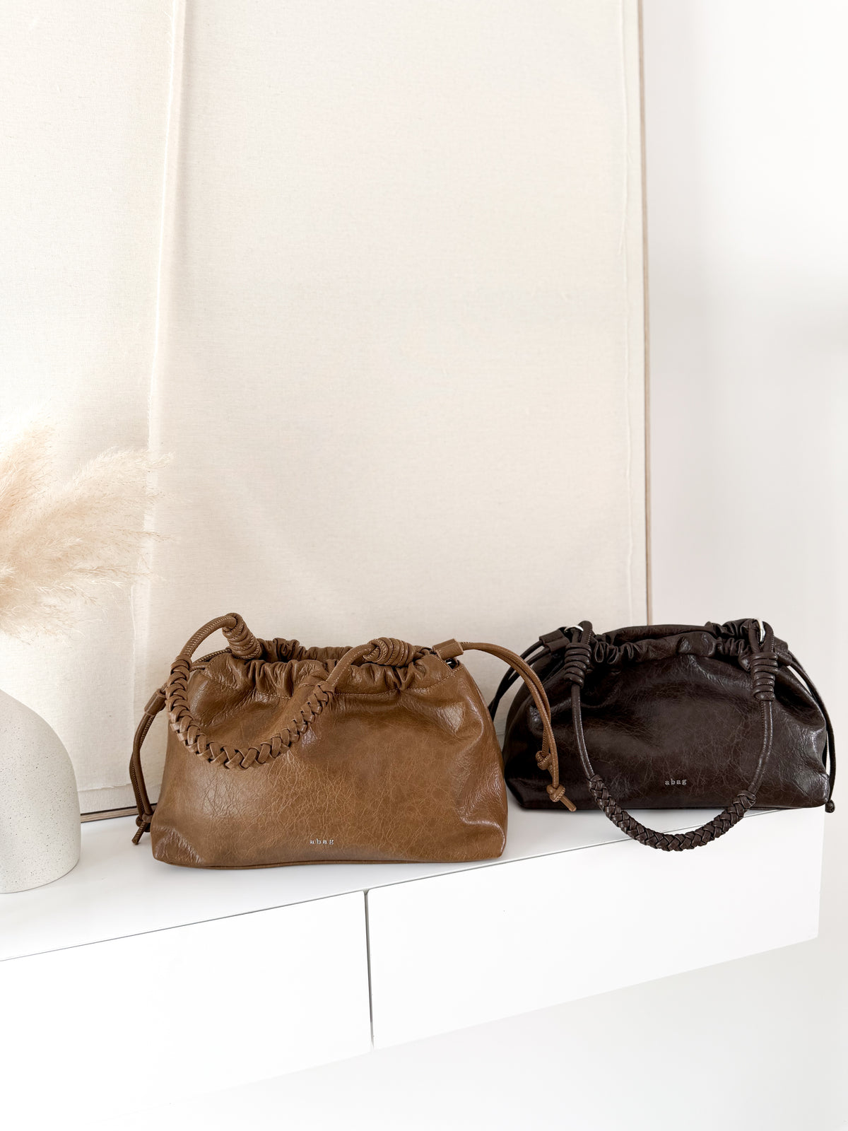 Bolso polipiel asa trenzada