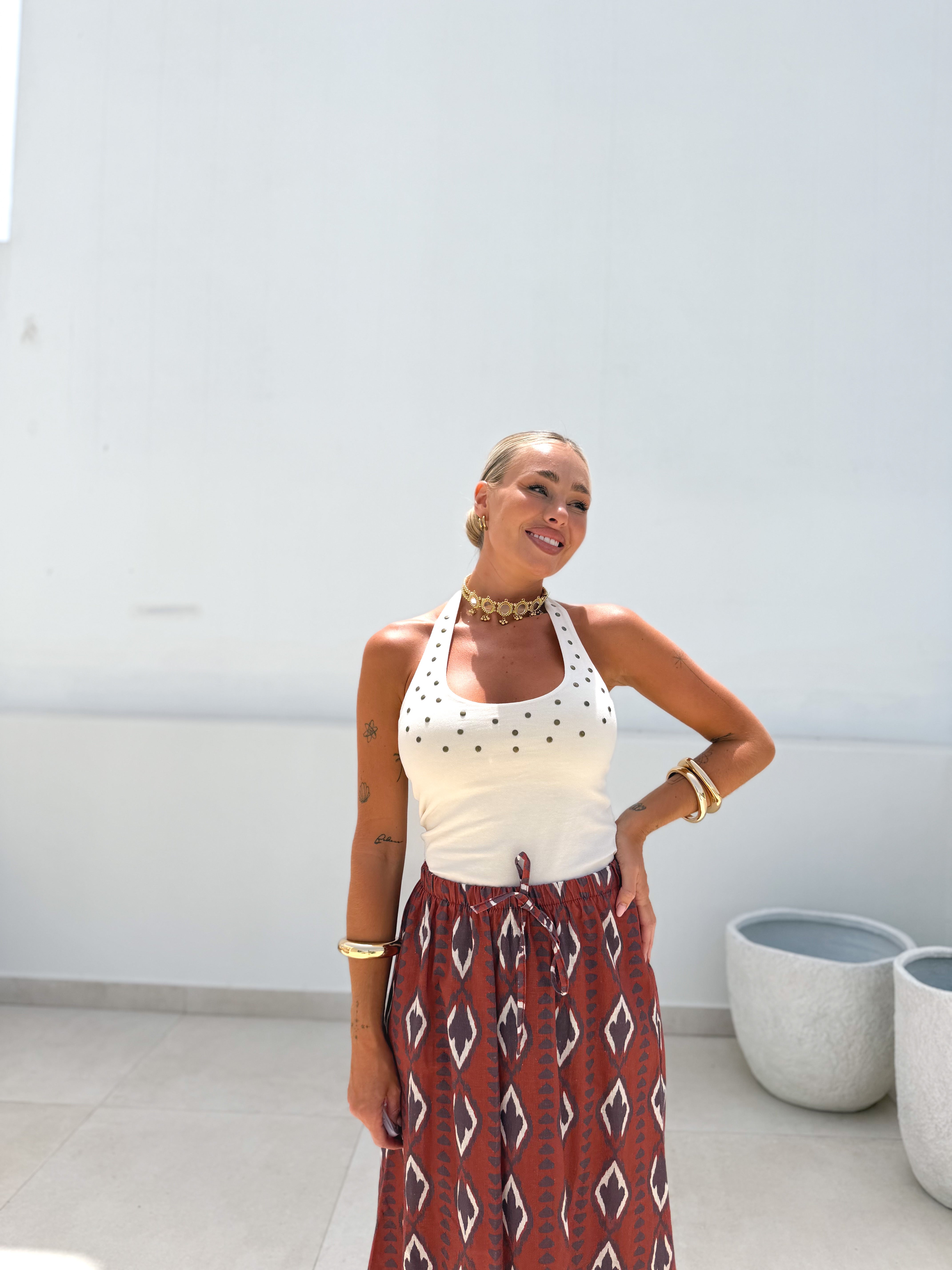 Top tachas beige