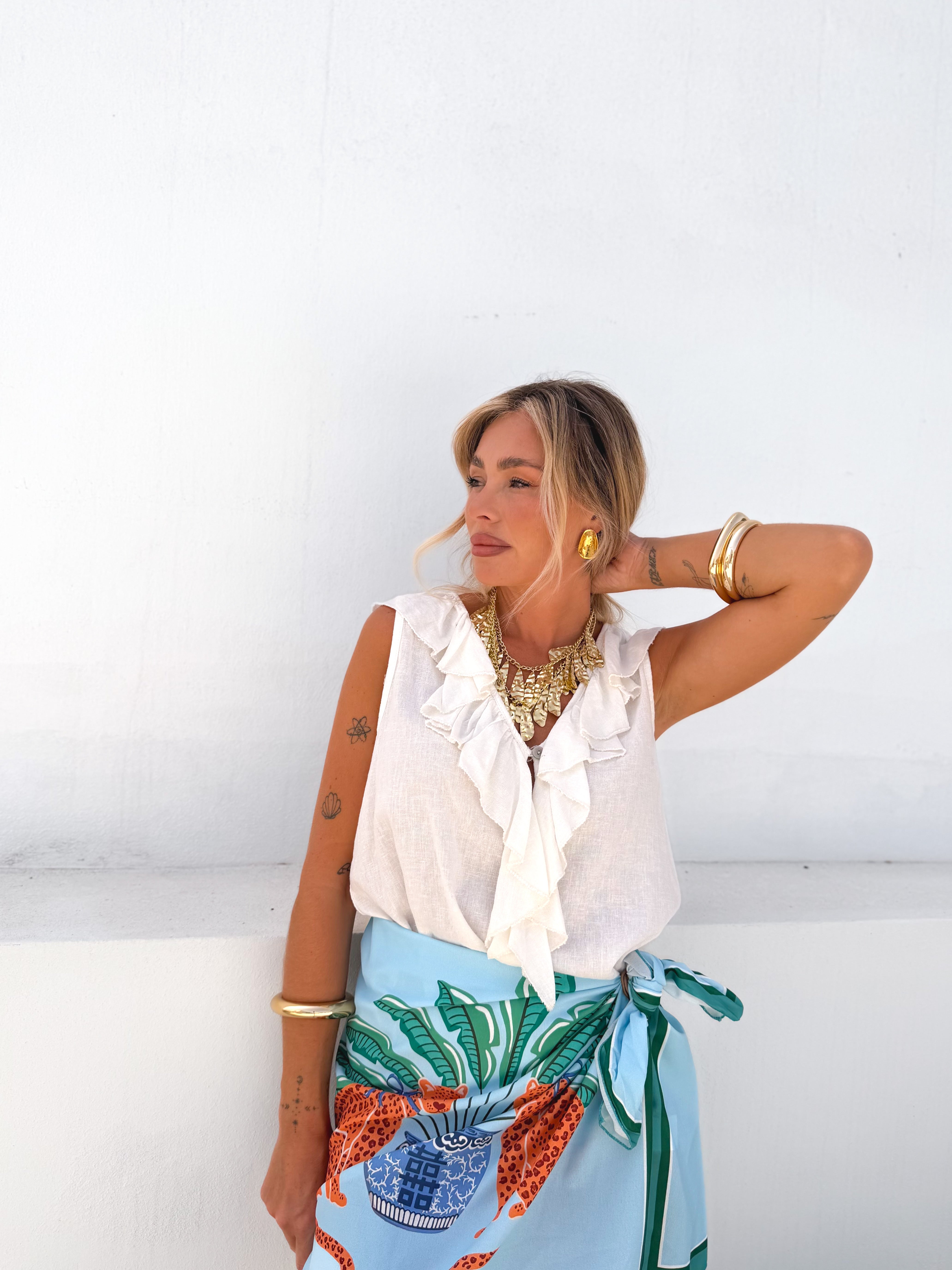 Blusa volantes cruda