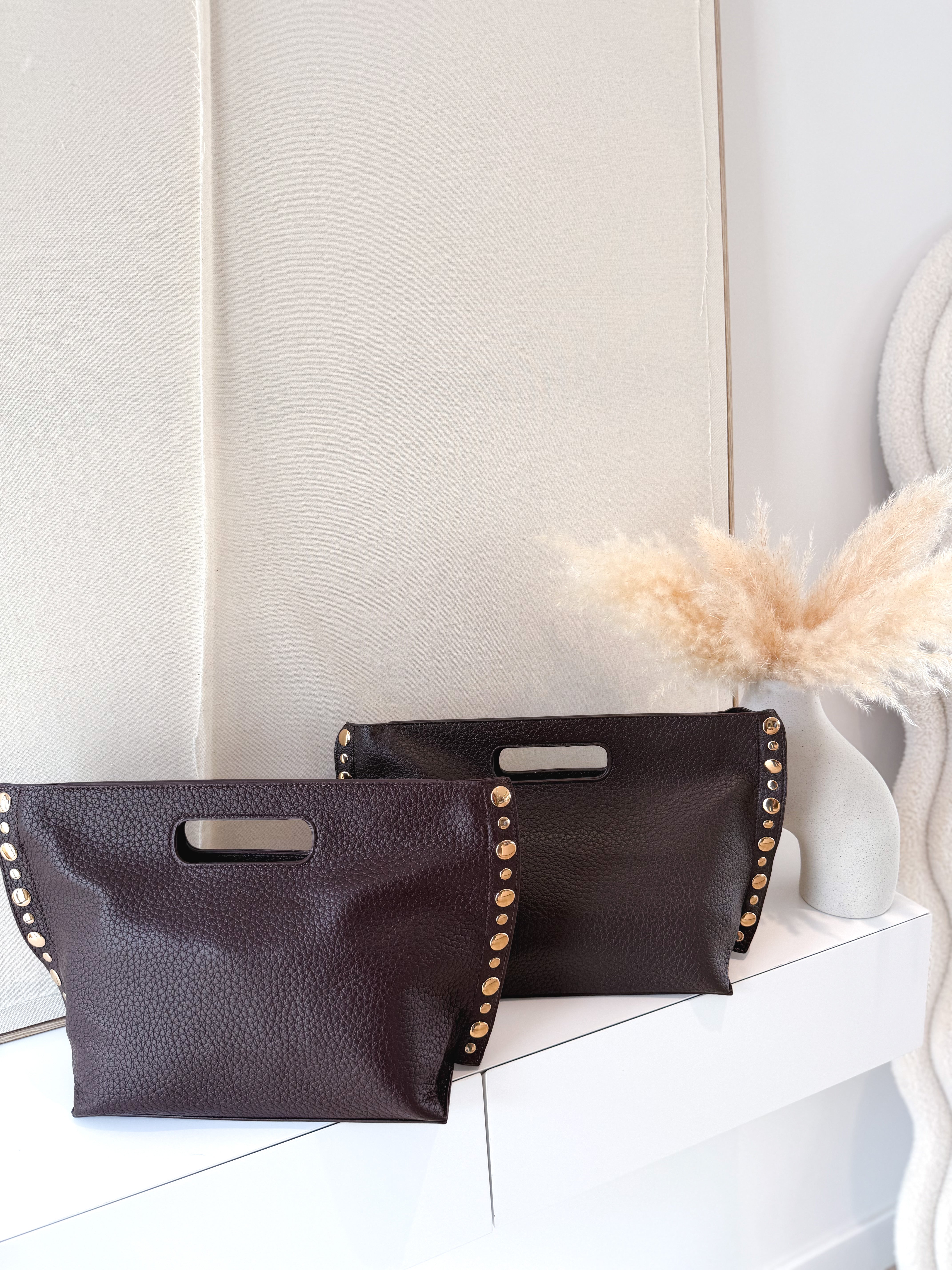 Bolso polipiel tachas