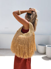 Bolso tachas y flecos