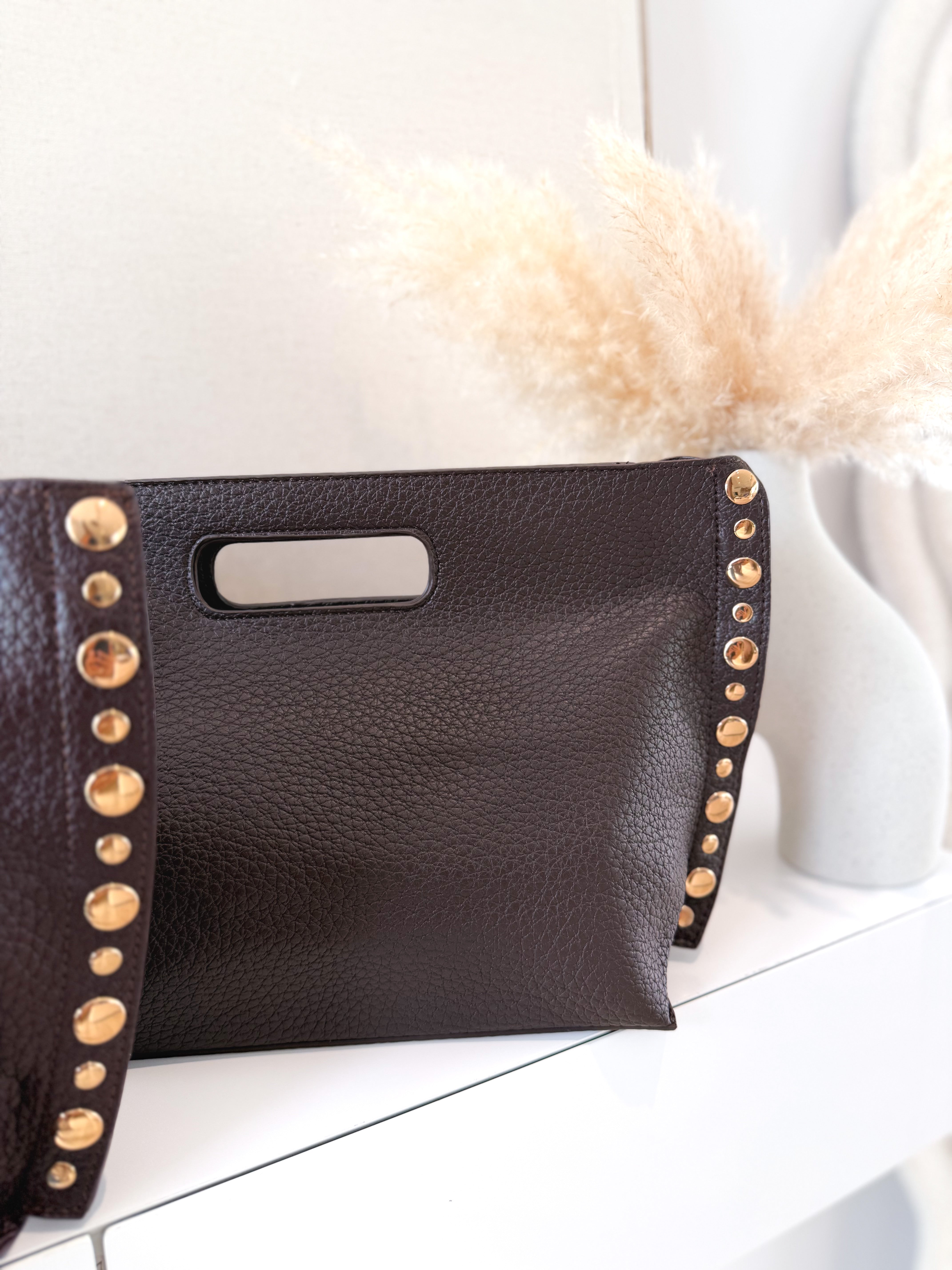 Bolso polipiel tachas