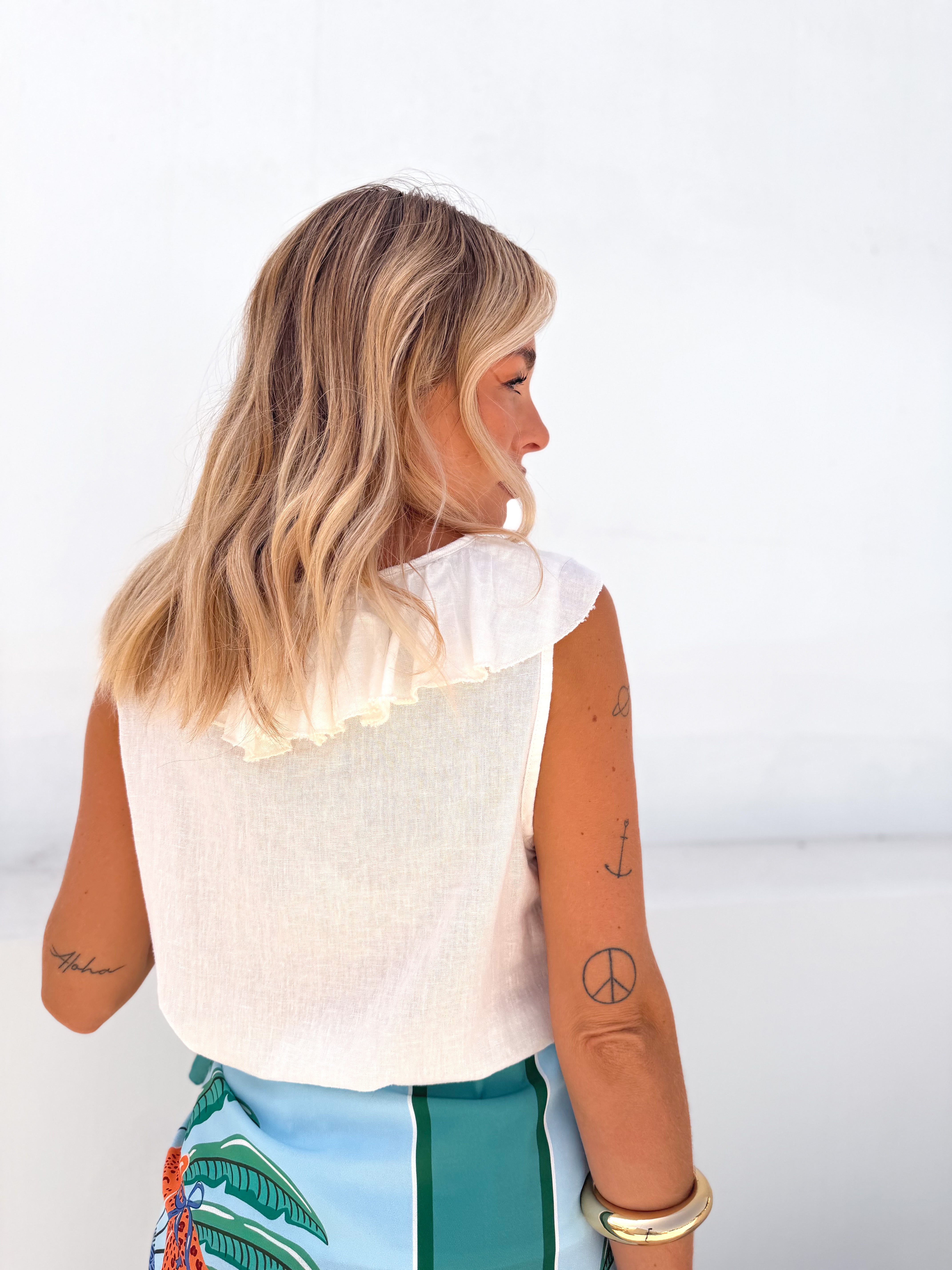 Blusa volantes cruda