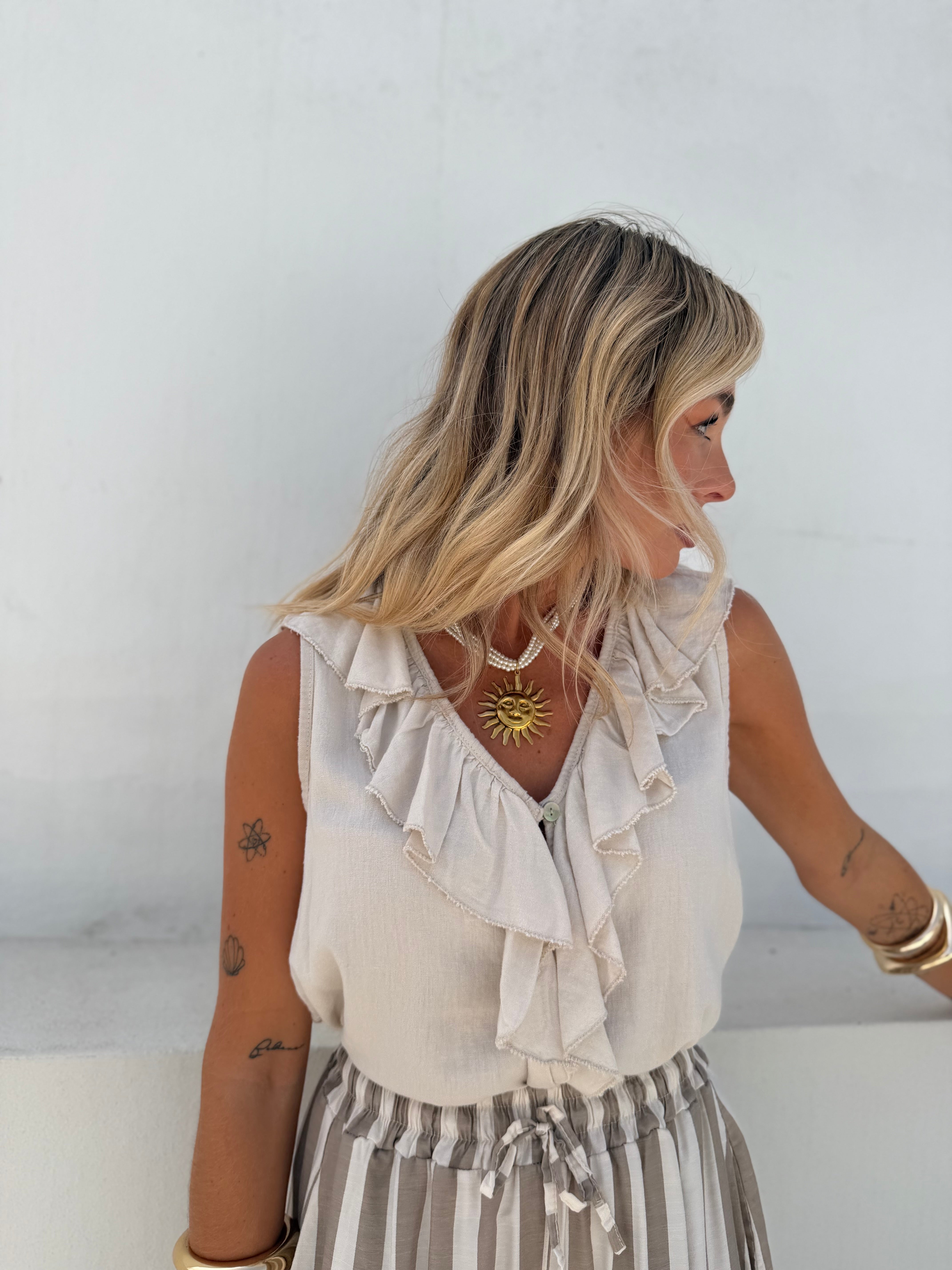 Blusa volantes beige