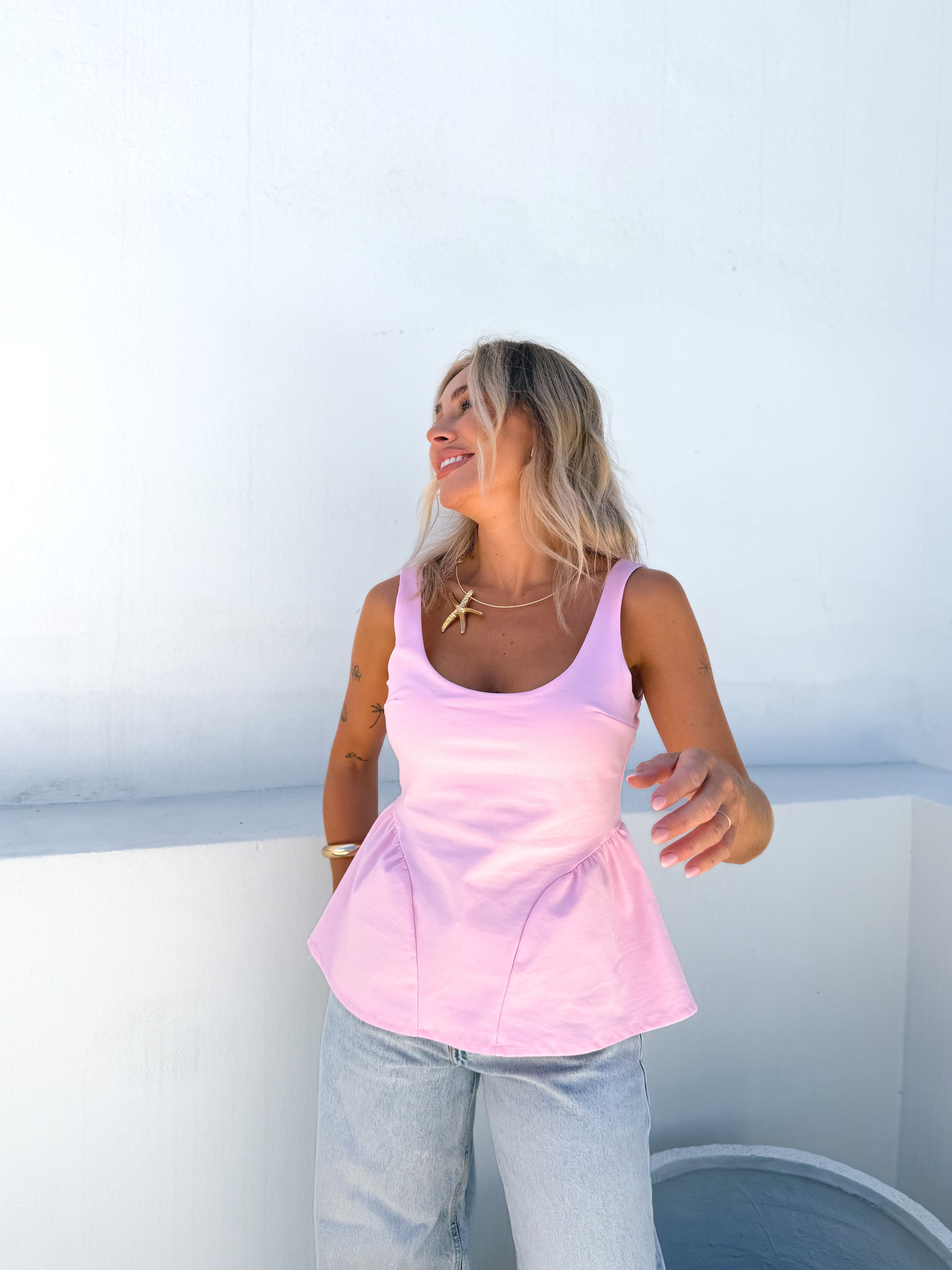 Top peplum rosa