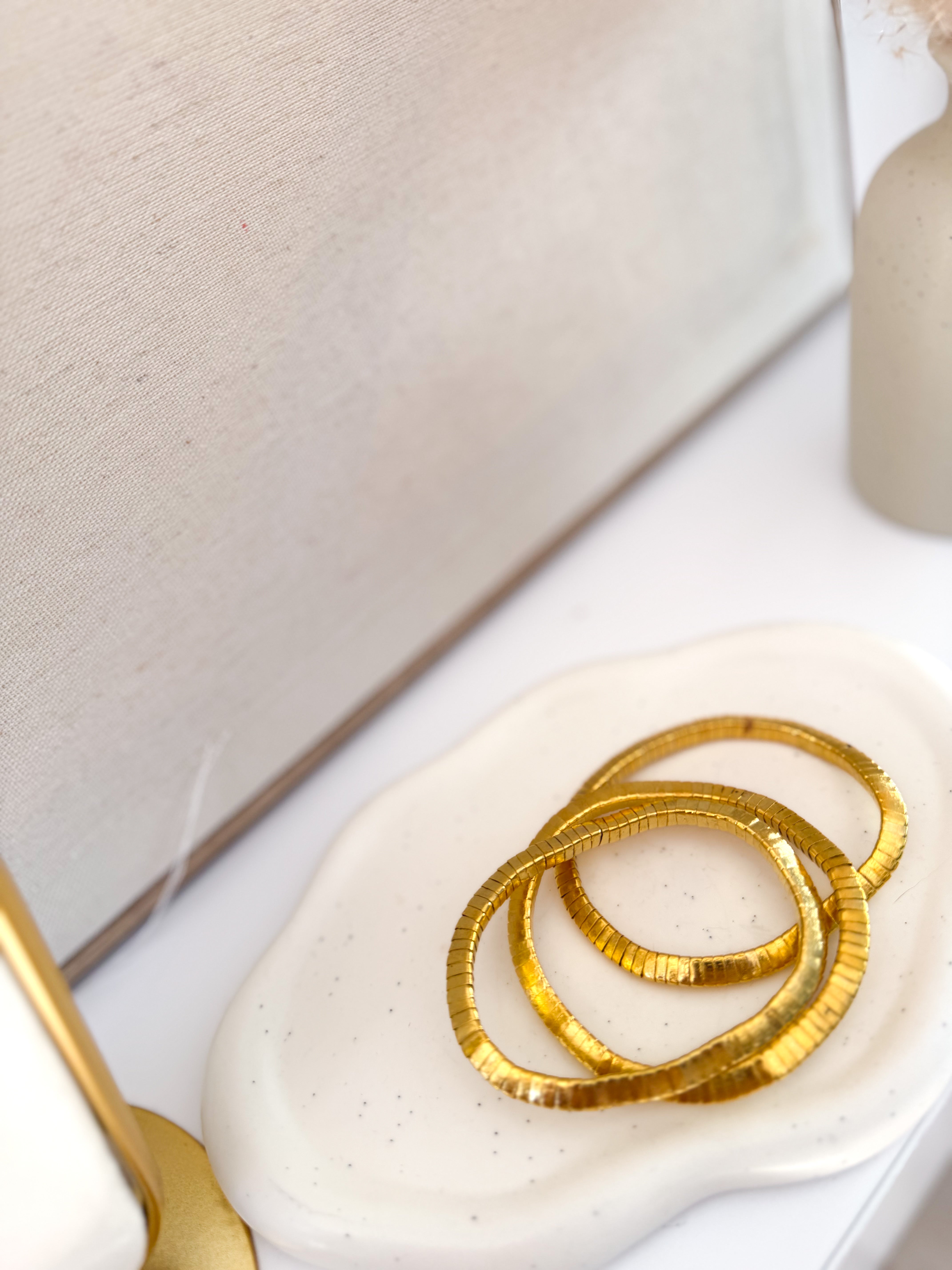 Pulseras flexibles oro