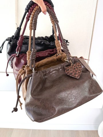 Bolso polipiel asa trenzada