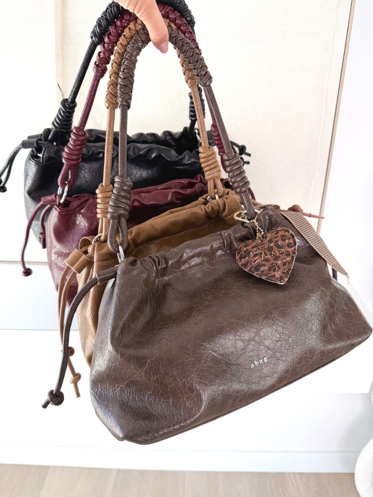 Bolso polipiel asa trenzada