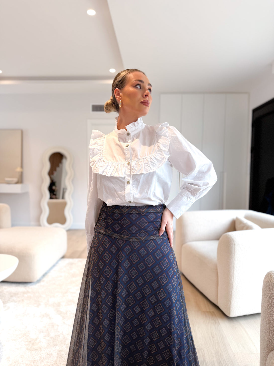 Blusa abotonada combinada