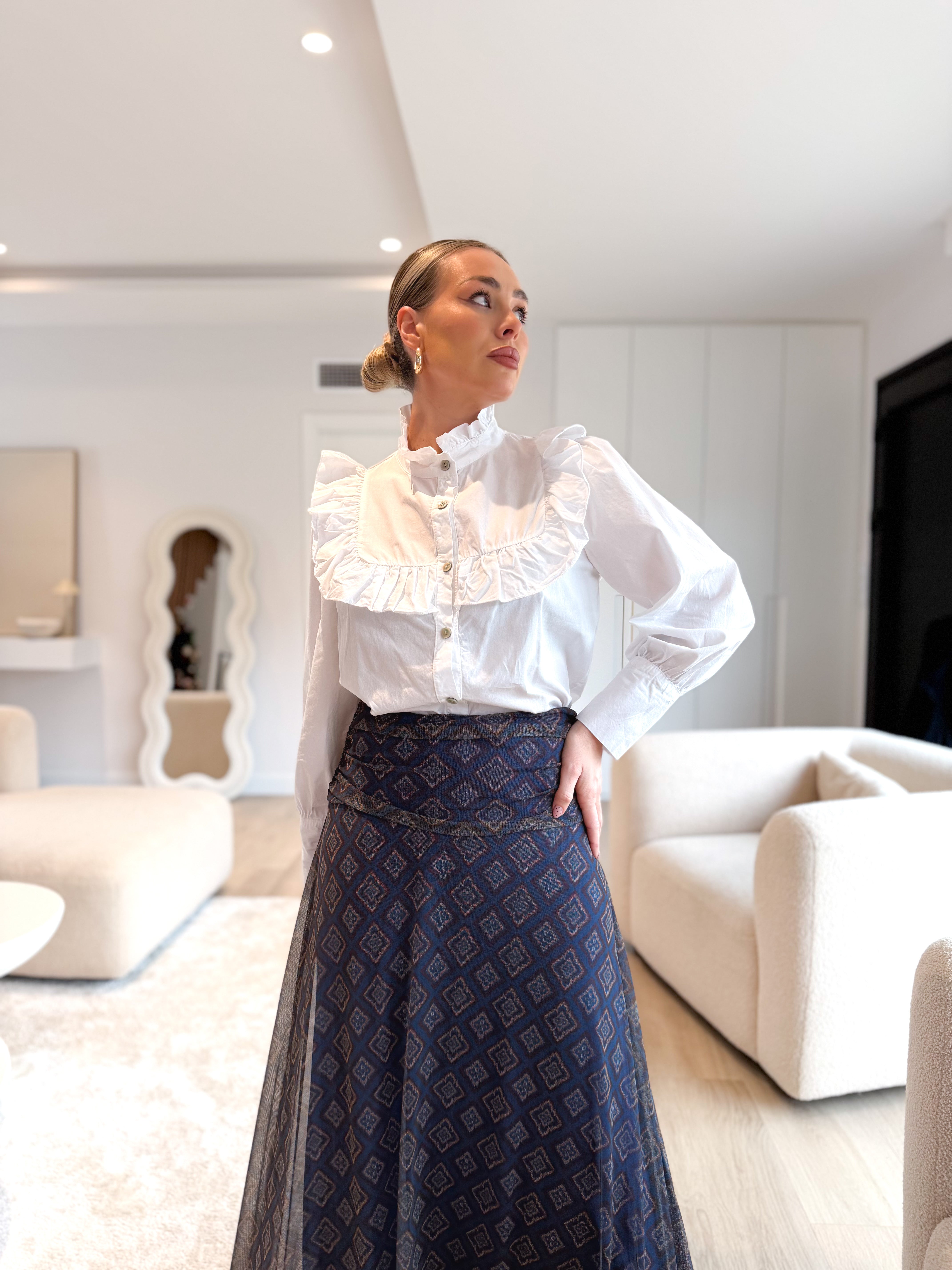 Blusa abotonada combinada