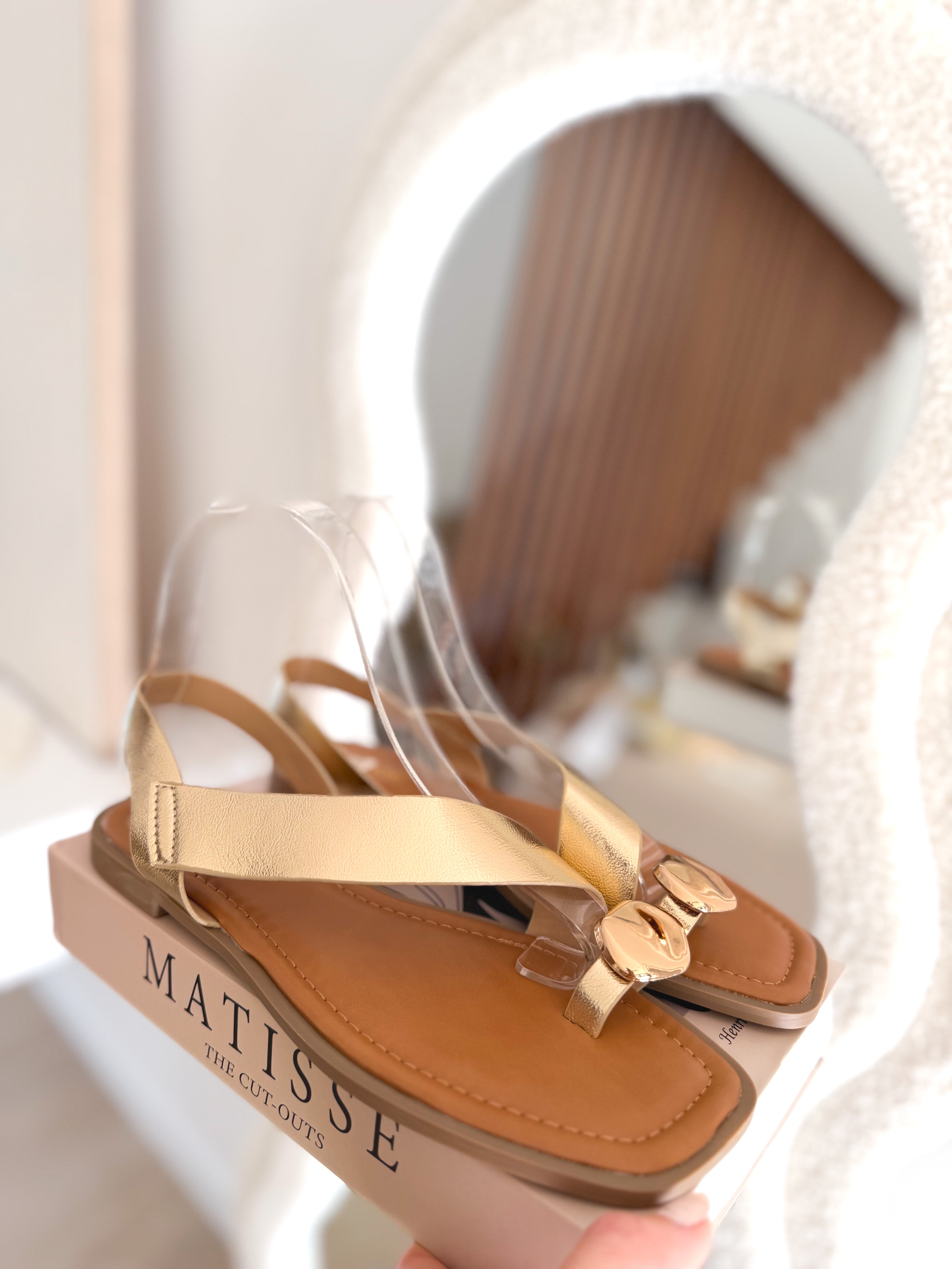 Sandalias planas Cruzadas oro