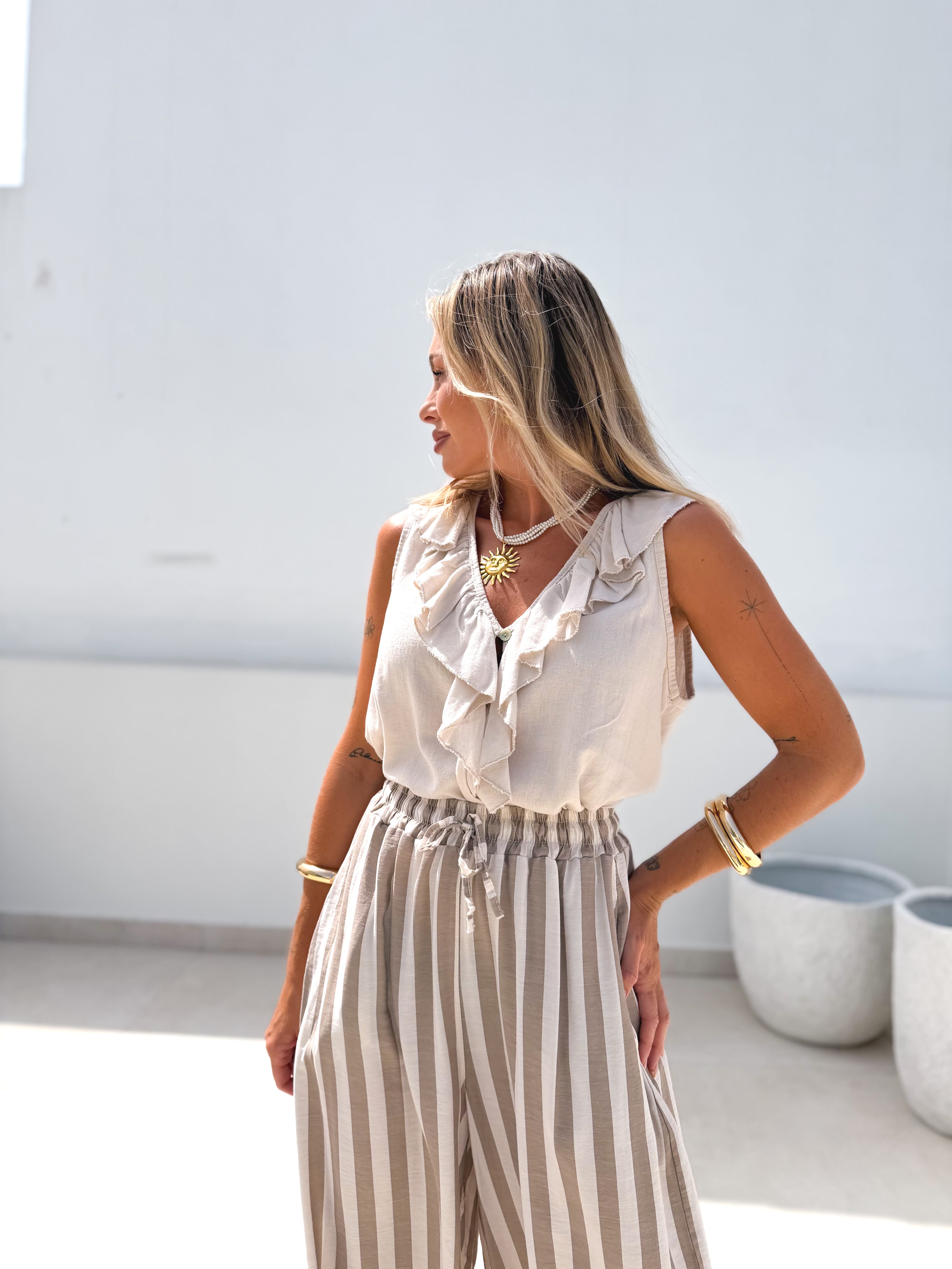 Blusa volantes beige