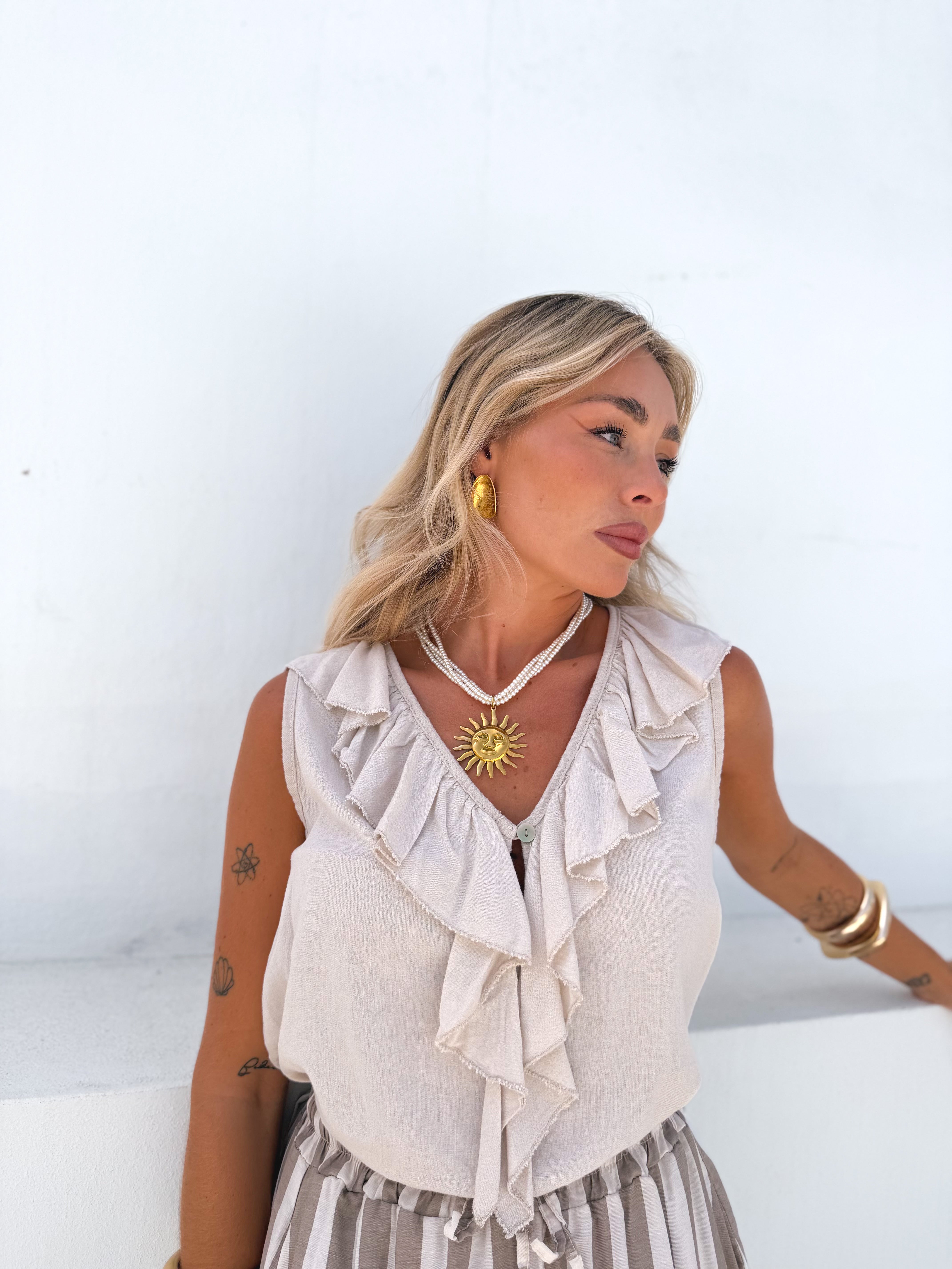 Blusa volantes beige