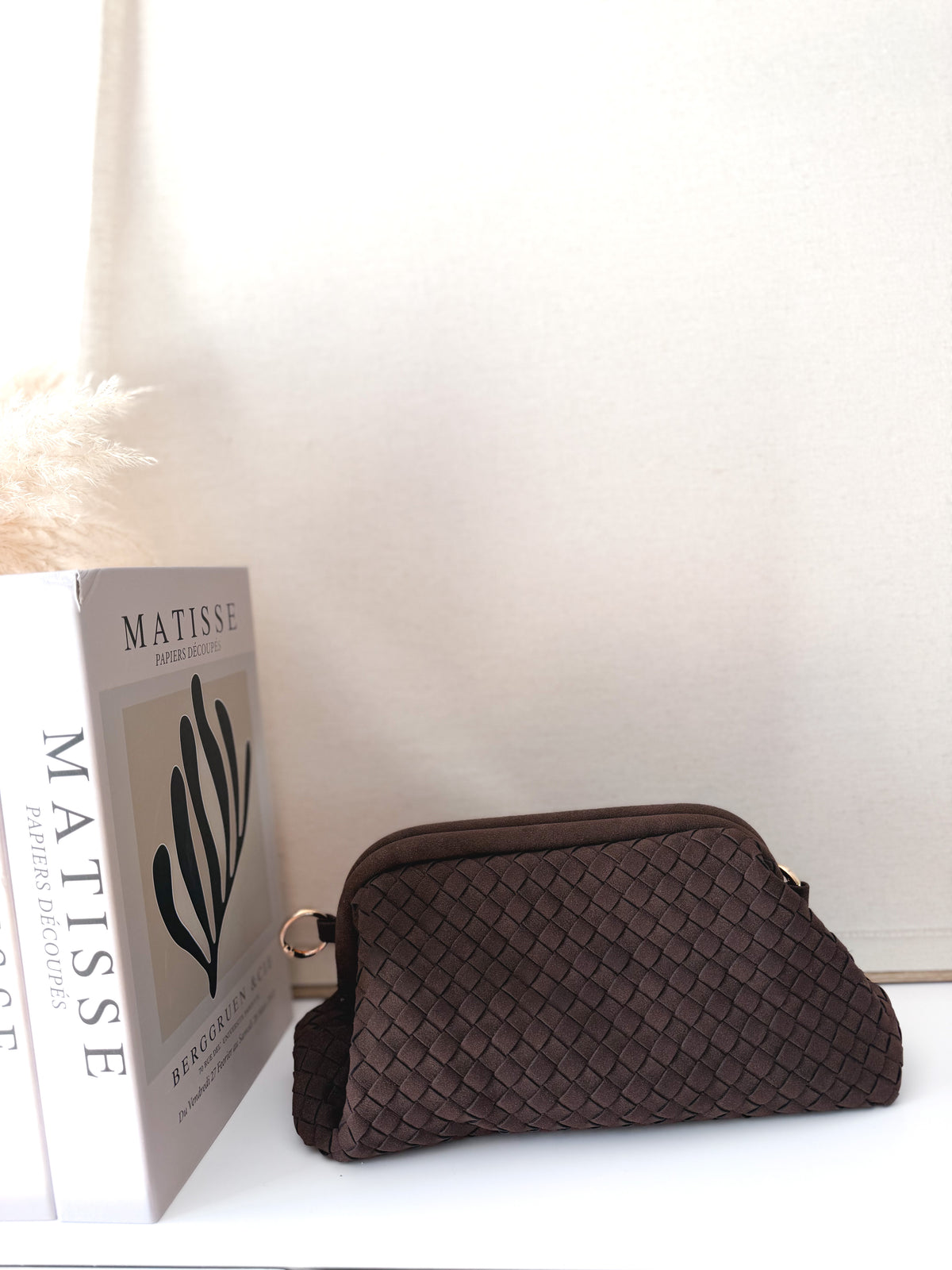 Bolso mano trenzado Moka