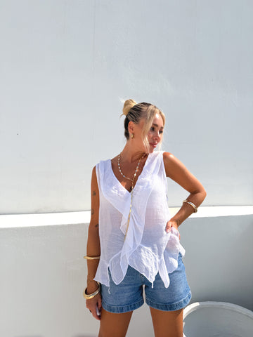 Camisa sin mangas volantes blanca