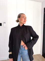 Blazer cruzada oversize negro