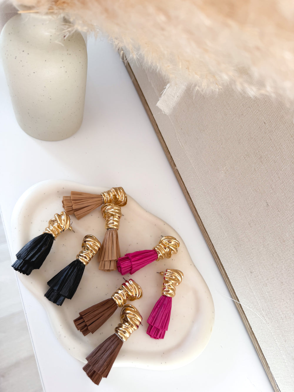 Pendientes flecos