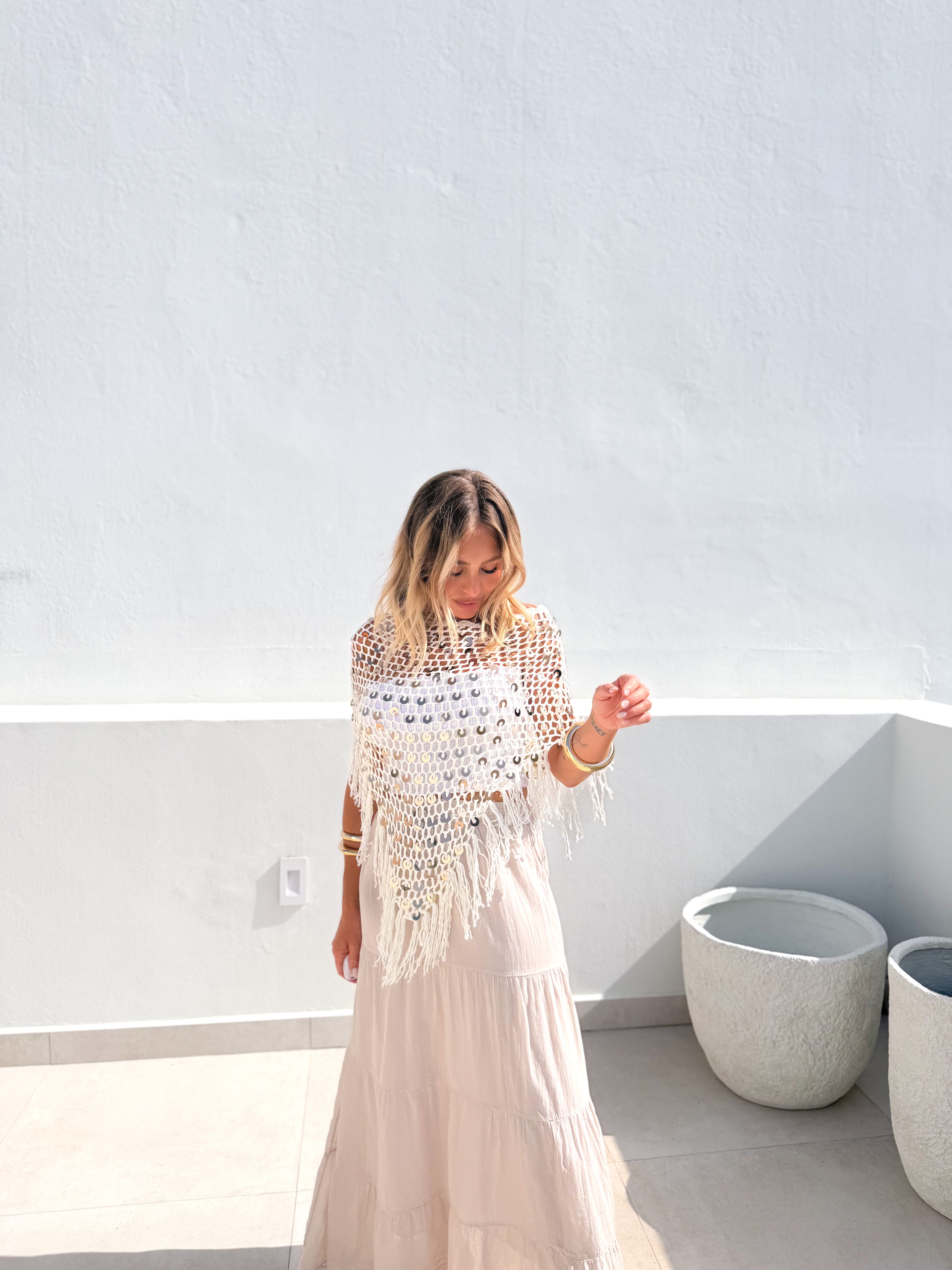 Poncho crochet crudo