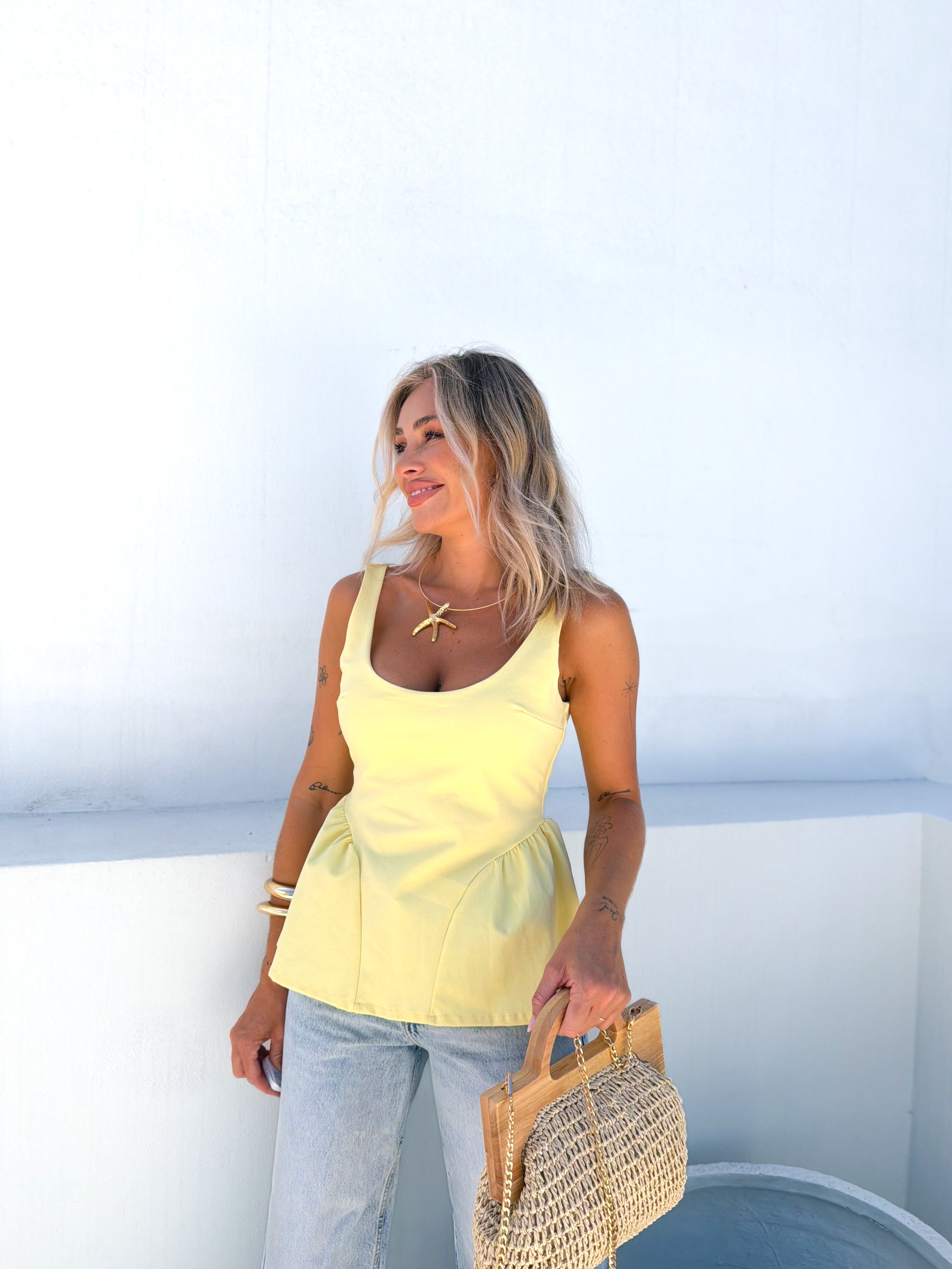 Top peplum Amarillo
