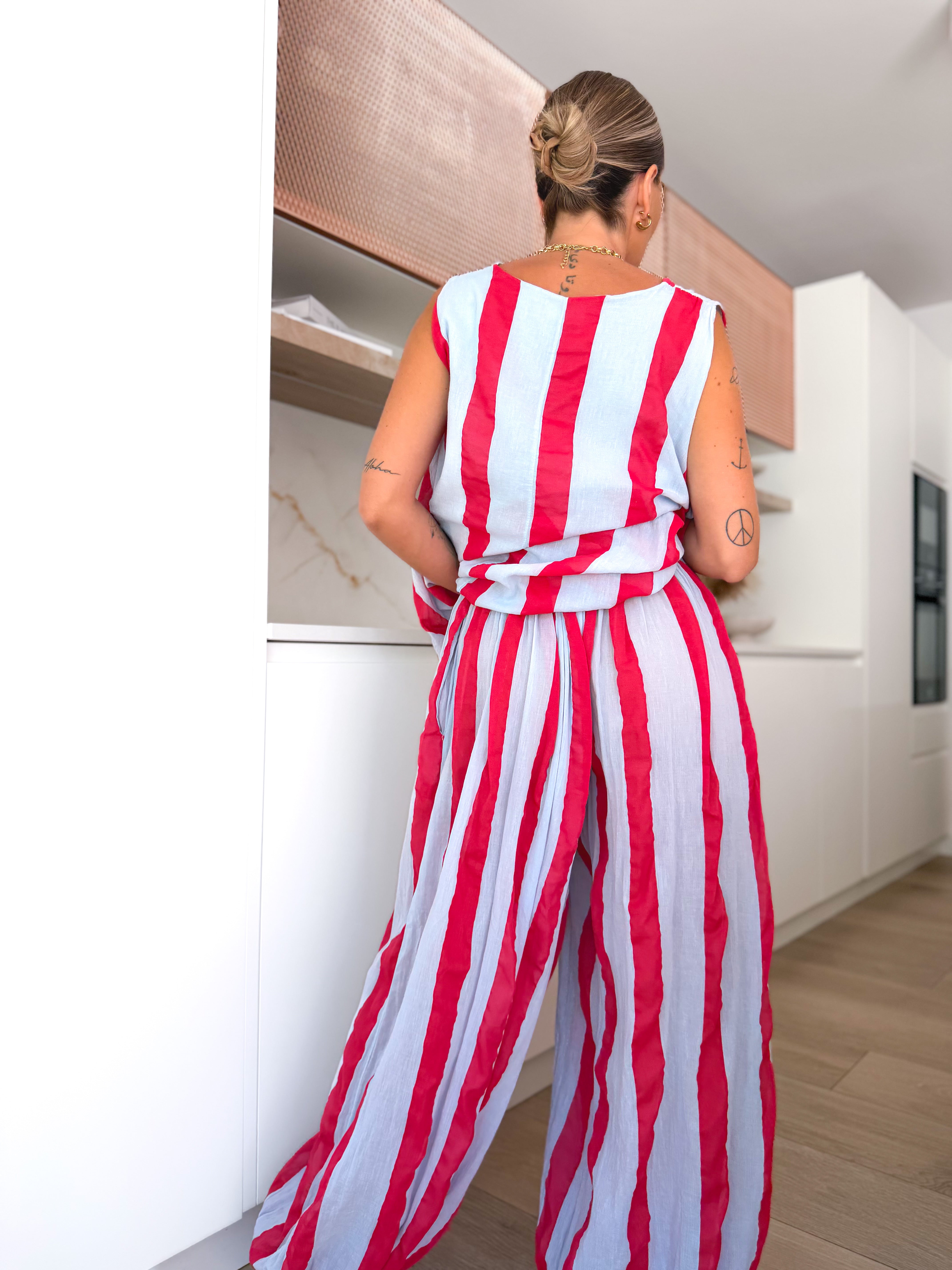 Pantalón rayas celeste / fucsia