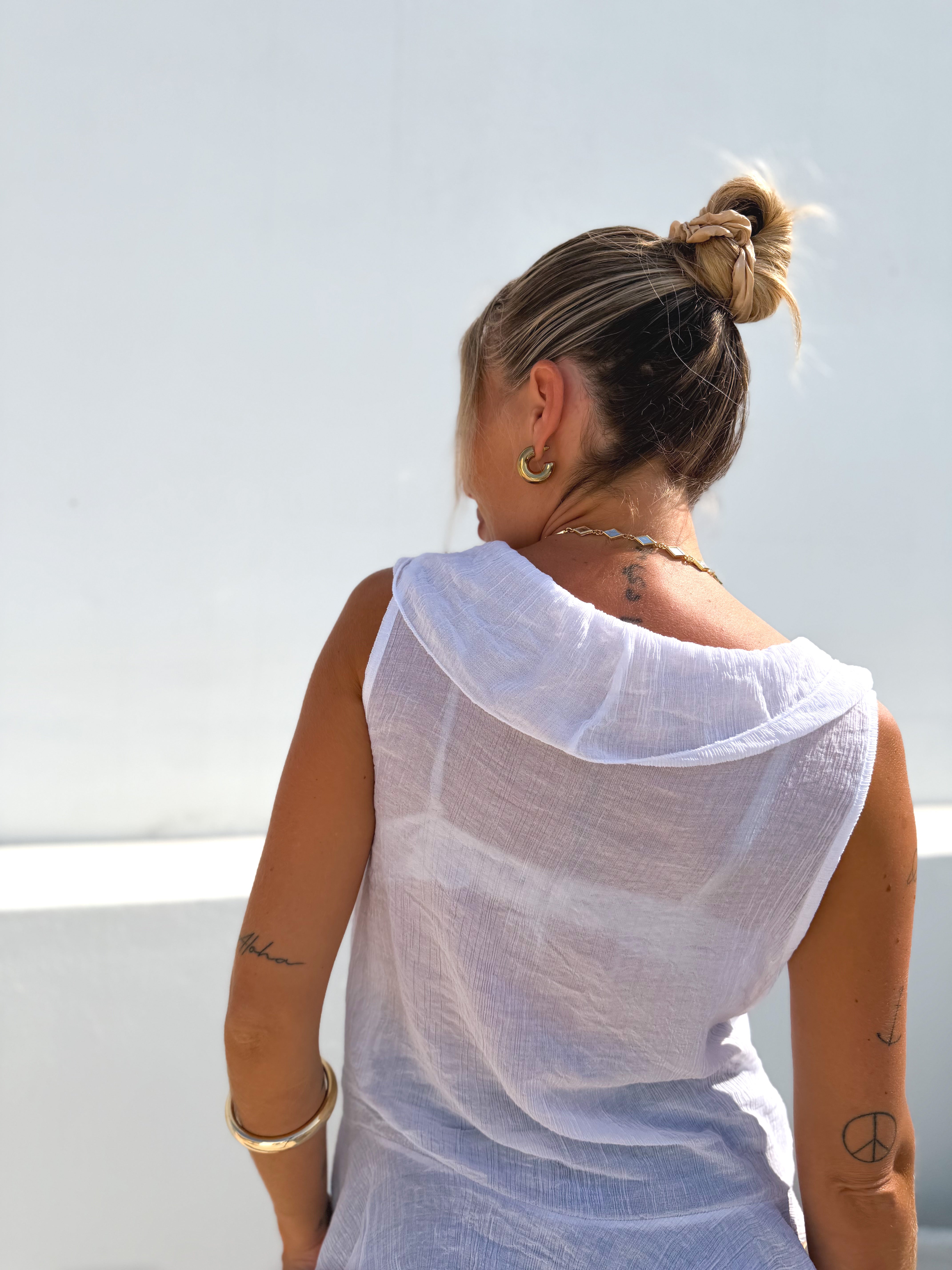 Camisa sin mangas volantes blanca