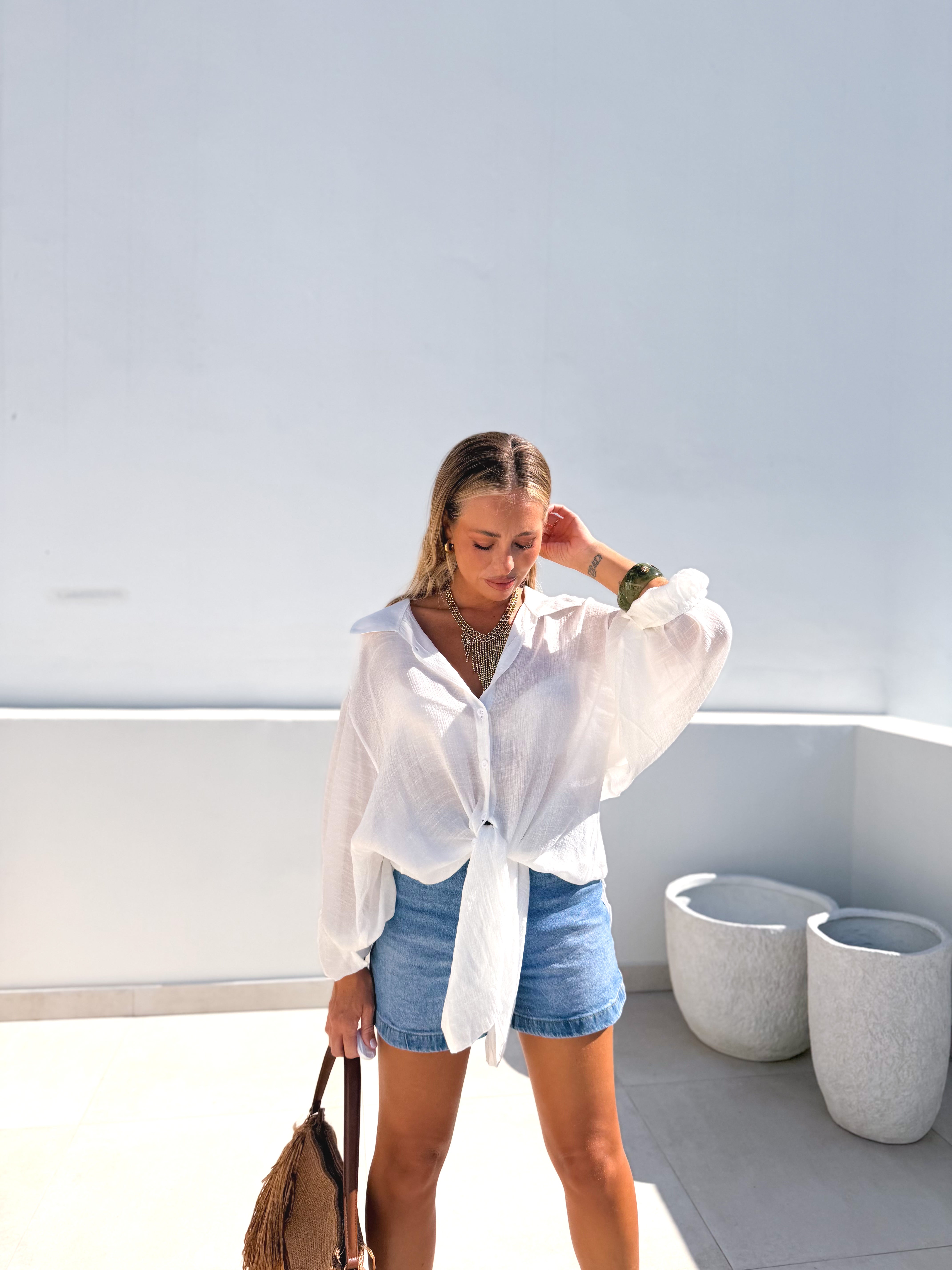 Camisa blanca multi posición